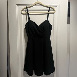 Francesca’s Rouched Black Mini Dress